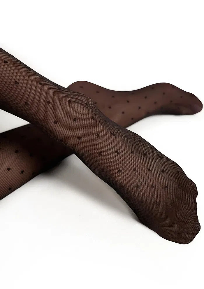 Close-up of polka dot tights texture showing reinforced toe construction